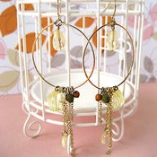 Image of goldtone hoops with dangles