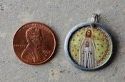 Image of Our Lady of Fatima spiritual token ( charm )