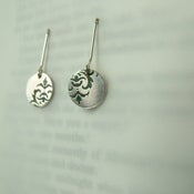 Image of Round offset motif earrings
