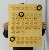 Image of Vintage 70s ring a date calender