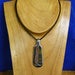 Image of paddle end pendant