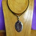 Image of spooned pendant