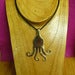 Image of curly tines pendant