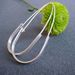 Image of modern teardrop hoops