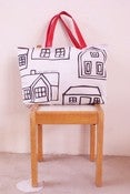 Image of *hand*bag-houses and leaves