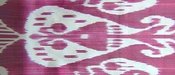 Image of plum ikat cushion