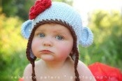 Image of Cotton Mini Monkey Flap Hat- Baby Blue with Chocolate Trim and Cherry Flower