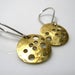 Image of harvest moons. earrings. brass.