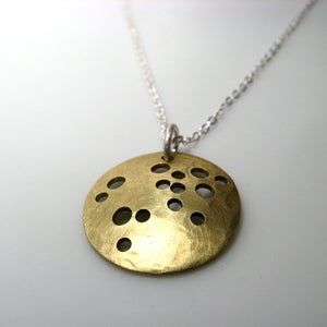 Image of harvest moon. necklace. brass.