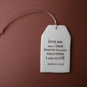 Image of ceramic quote tag - love me when i least deserve it...