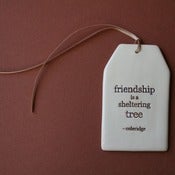 Image of ceramic quote tag - sheltering tree