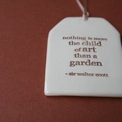 Image of ceramic quote tag - child of art
