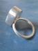 Image of chunky silver ring letter r/biege