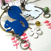 Image of leather squirrel interconvertible necklace and bag charm