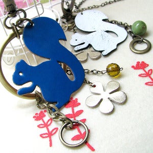 Image of leather squirrel interconvertible necklace and bag charm