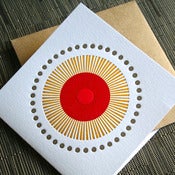 Image of red and mustard starburst | single