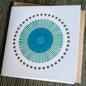 Image of turquoise and green starburst | single