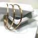 Image of modern stackable cuffs. bracelets. brass.
