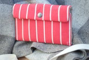 Image of striped red clutch