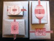 Image of Small Red Letterpress Buckle with ribbon