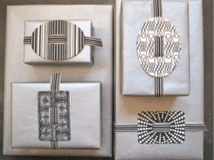 Image of Small Black Letterpress Buckle with ribbon