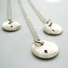 Image of initial pod. circle. necklace. sterling silver.