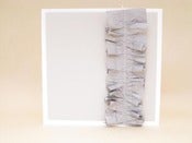 Image of grey / silver ruffle