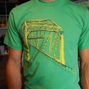 Truss bridge on grass gren $25