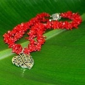 Image of Monstera Pendant Small with Coral Necklace