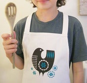 Image of child's apron in blue or pink