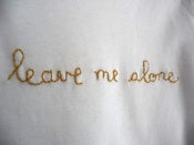 Image of t-shirt "leave me alone"