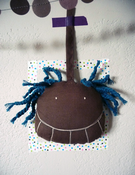 Image of porte clef tête "marron-turquoise"