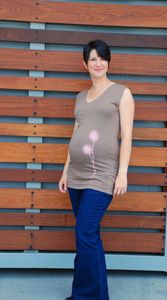 Image of brown v-neck pink dandelion maternity top