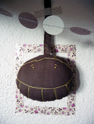 Image of porte clef tête "marron-jaune"