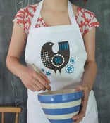 Image of adult's apron in blue or pink