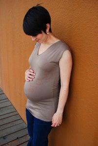 Image of brown v-neck orange gingko maternity top