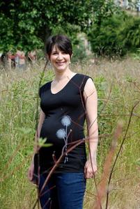 Image of black v-neck dandelion maternity top