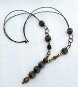 Image of Collar V Ojo de tigre