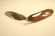 Image of pin your wings down