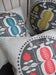 Image of pomegranate tree cushion in yellow on natural linen