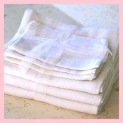 Image of Set da bagno delicato (guanti e asciugamani) 