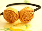 Image of double trouble rosette on black satin u shape headband {choose your color}