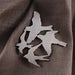 Image of flock brooch