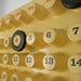 Image of Vintage 70s ring a date calender