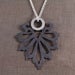 Image of black paisley pendant