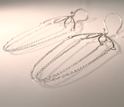 Image of sterling silver poppy pod earrings