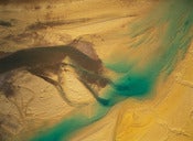Image of Photograph, 'Meltwater Flowing Over Golden Sand and Silt Bars, Baffin Islands' 1994; "ARTIC" Series 