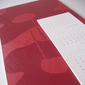 Image of happy days calendar . flora