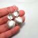 Image of inside out disks. earrings. sterling silver.