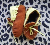 Image of lime zig zags/rust suede